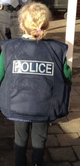 Birthday Adventure -girl wearing police vest