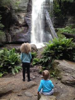 Family Quest - siblings at a waterfall
